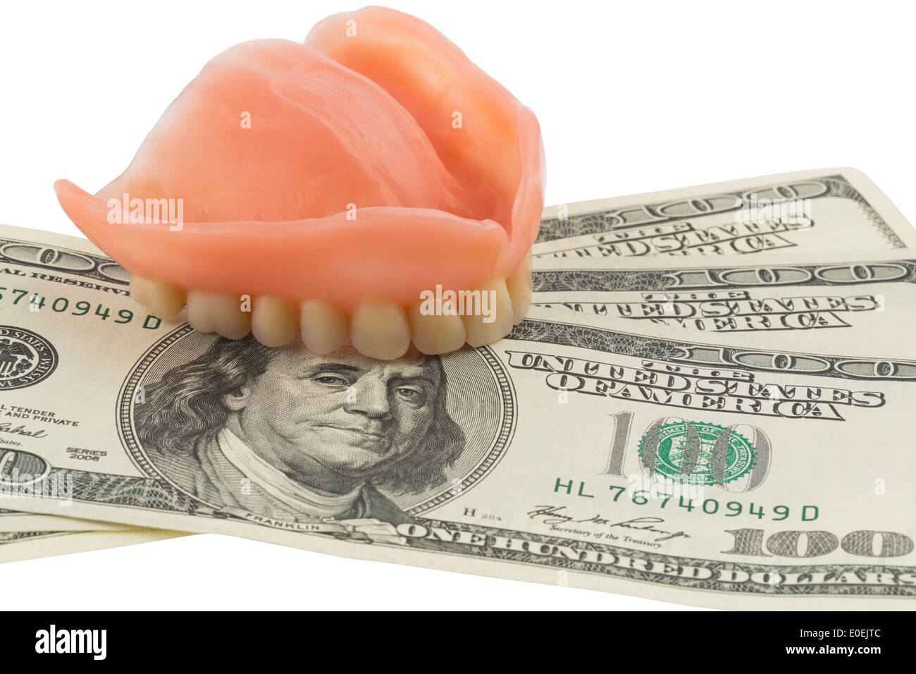 Satz von Zähnen und Dollar Noten, symbolische Foto für Prothesen, medizinische Kosten und Zuzahlung, Gebiss Und Dollarschein Stockfoto