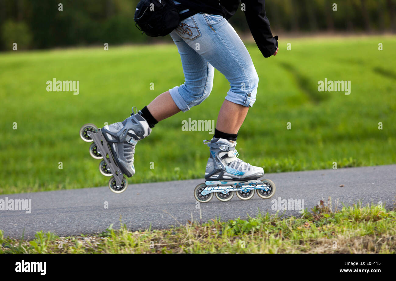 Inline-Skating Frau Stockfoto