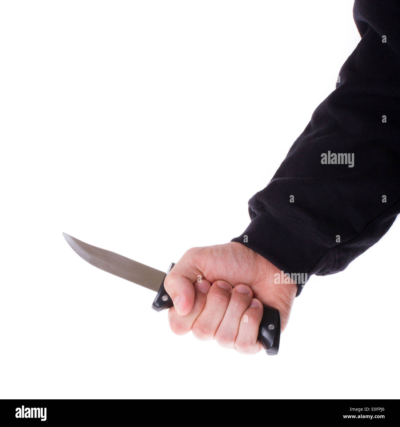Mit einem scharfen Messer in es männlich ist hand Stockfoto