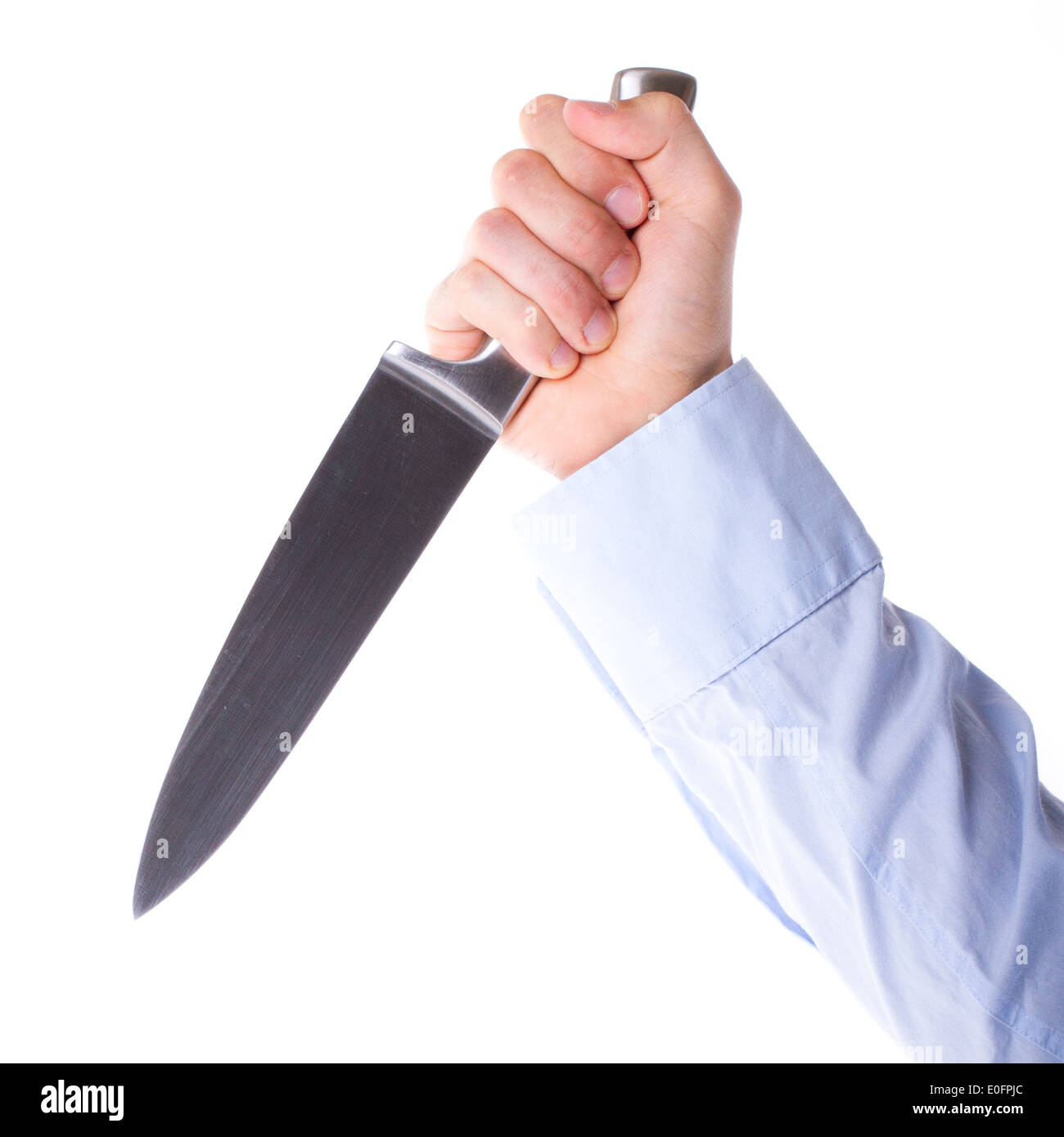 Mit einem scharfen Messer in es männlich ist hand Stockfoto