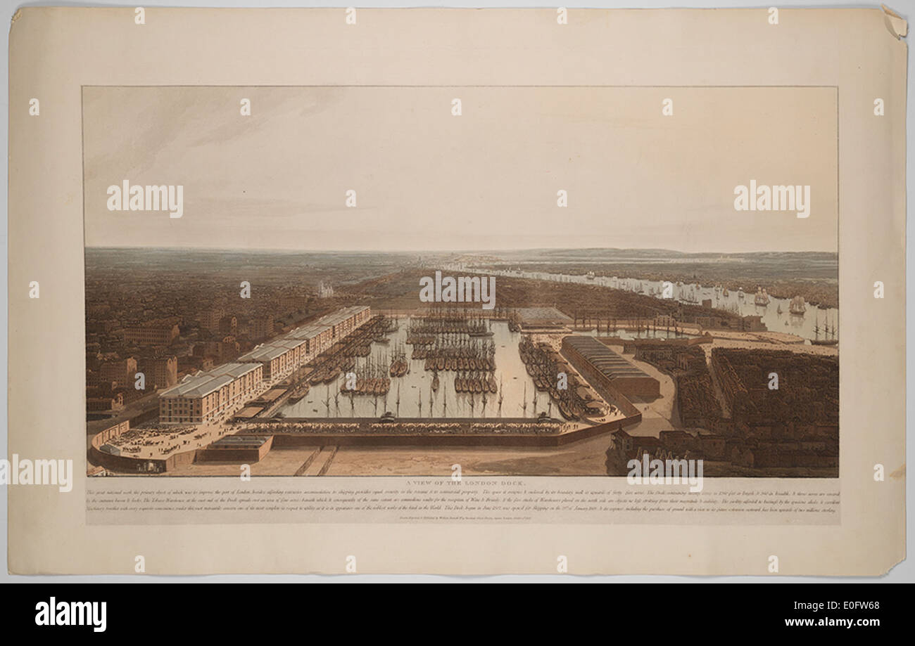 Ein historisches Foto des Londoner Docks, das die geschäftige Hafenaktivität mit Schiffen zeigt, die Fracht laden und entladen. Dieses Bild zeigt die Bedeutung des Docks in der Londoner Handelsgeschichte und seine Rolle im Welthandel. Stockfoto