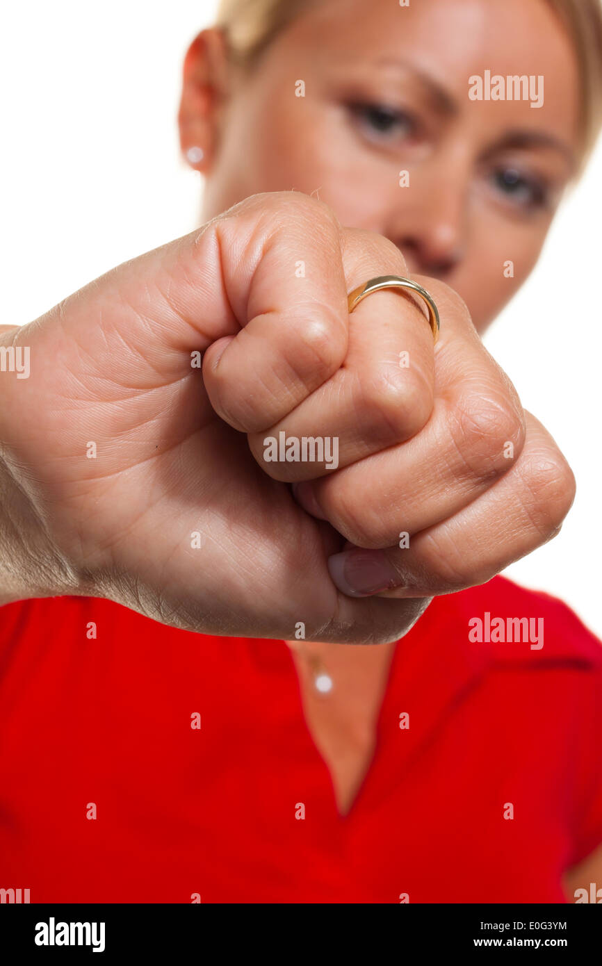 Eine junge Frau ballt die Hand zur Faust. Symbolische Foto für Wut und mehr schlecht., Eine Junge Frau Ballt Hand Zur Faust. Symbolfo Stockfoto