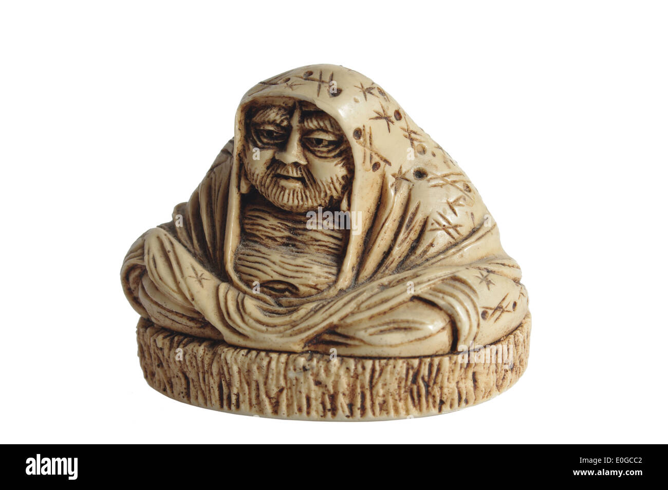 Statuette Buddy mit Elfenbein auf weißem Hintergrund Stockfoto