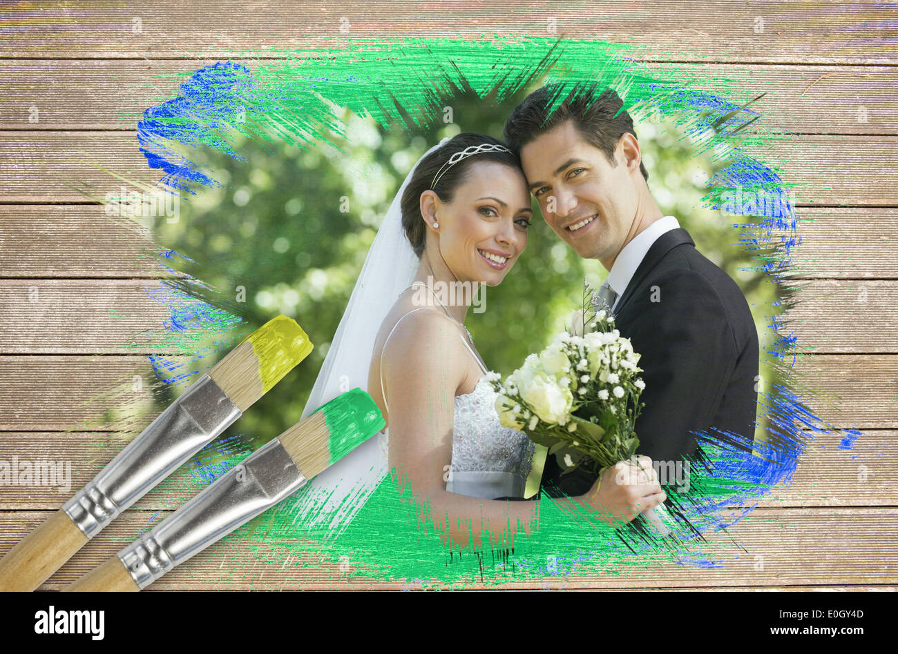 Zusammengesetztes Bild des Brautpaares lächelnd in die Kamera Stockfoto