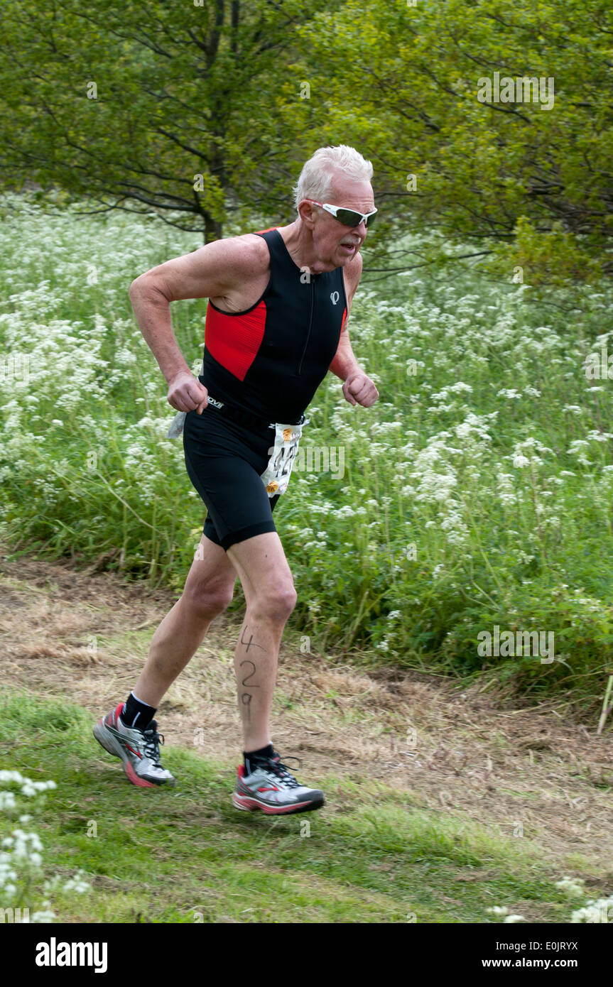 Stratford 220 Triathlon, älterer Mann im laufenden Phase Stockfoto