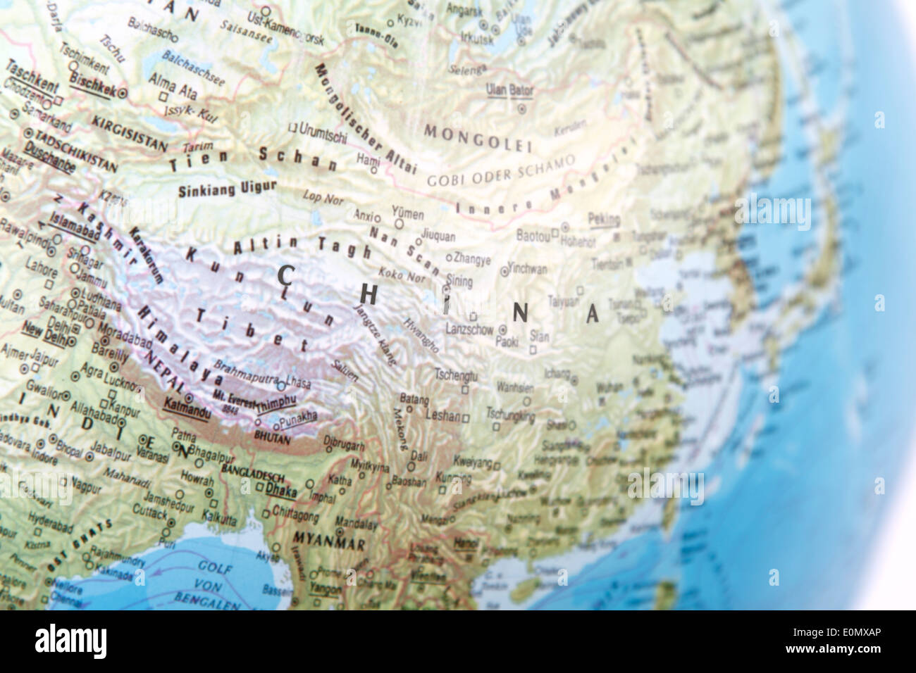 China auf dem Globus Stockfoto