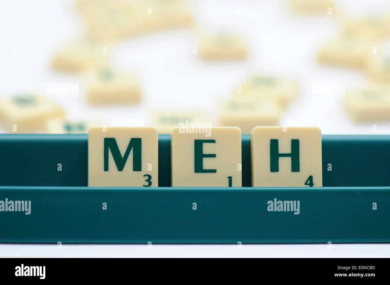 Scrabble Fliesen die Worte MEH auslesen Stockfoto
