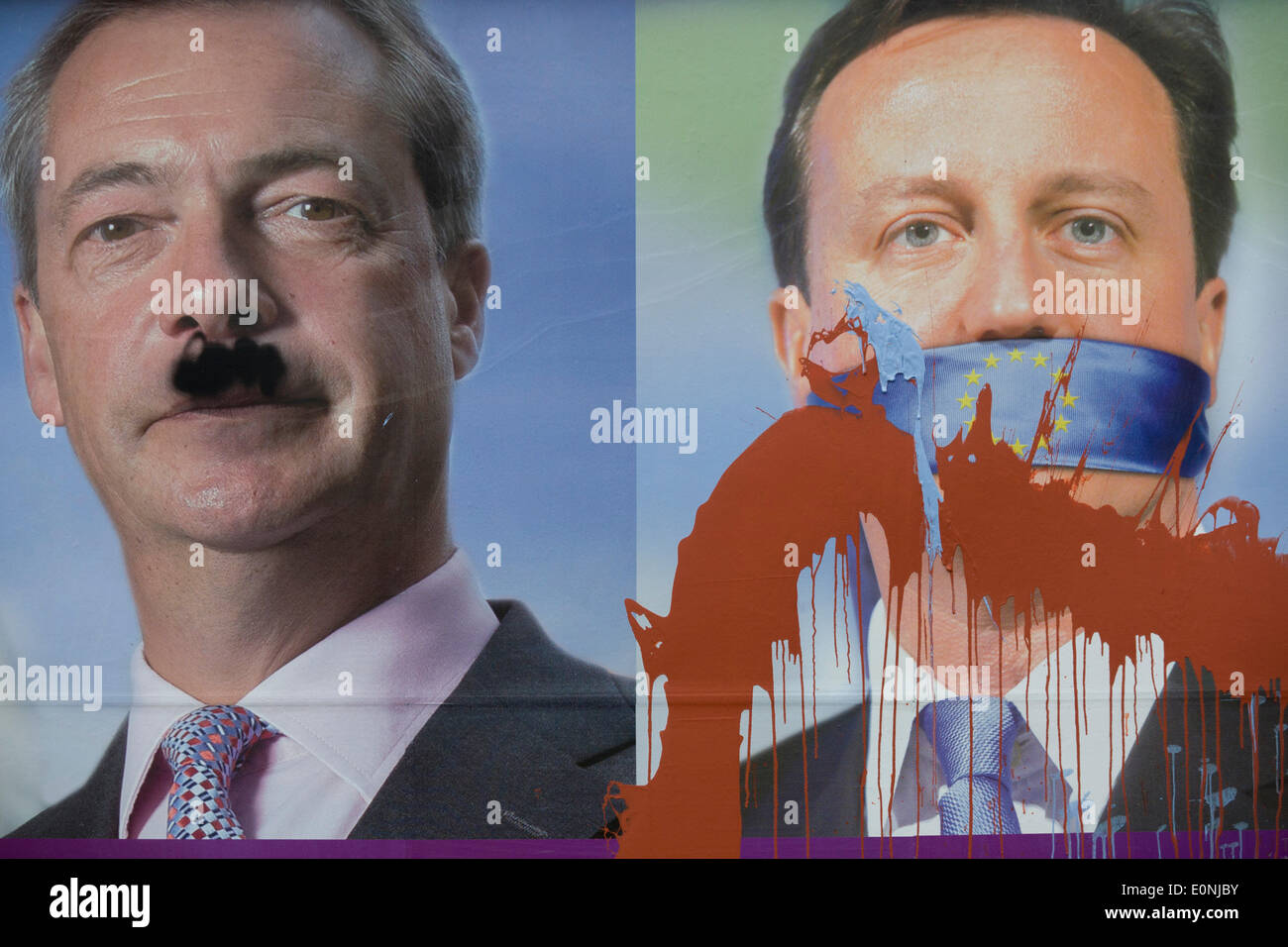 London, UK. 17. Mai 2014: spritzte Farbe tropfte eine Anti-EU-Mitgliedschaft "UK Independence Party (UKIP) politischen Plakat zeigt Führer Nigel Farage (mit getupften Hitler Schnurrbart) und eine geknebelt Premierminister David Cameron, Stille gegen Mobbing Europäische Union in East Dulwich - ein relativ wohlhabenden Stadtteil von Südlondon gesehen. Die Anzeige wird vor den Wahlen zum Europäischen Parlament am 22. Mai angezeigt. Copyright Richard Baker / Alamy Live News. Stockfoto