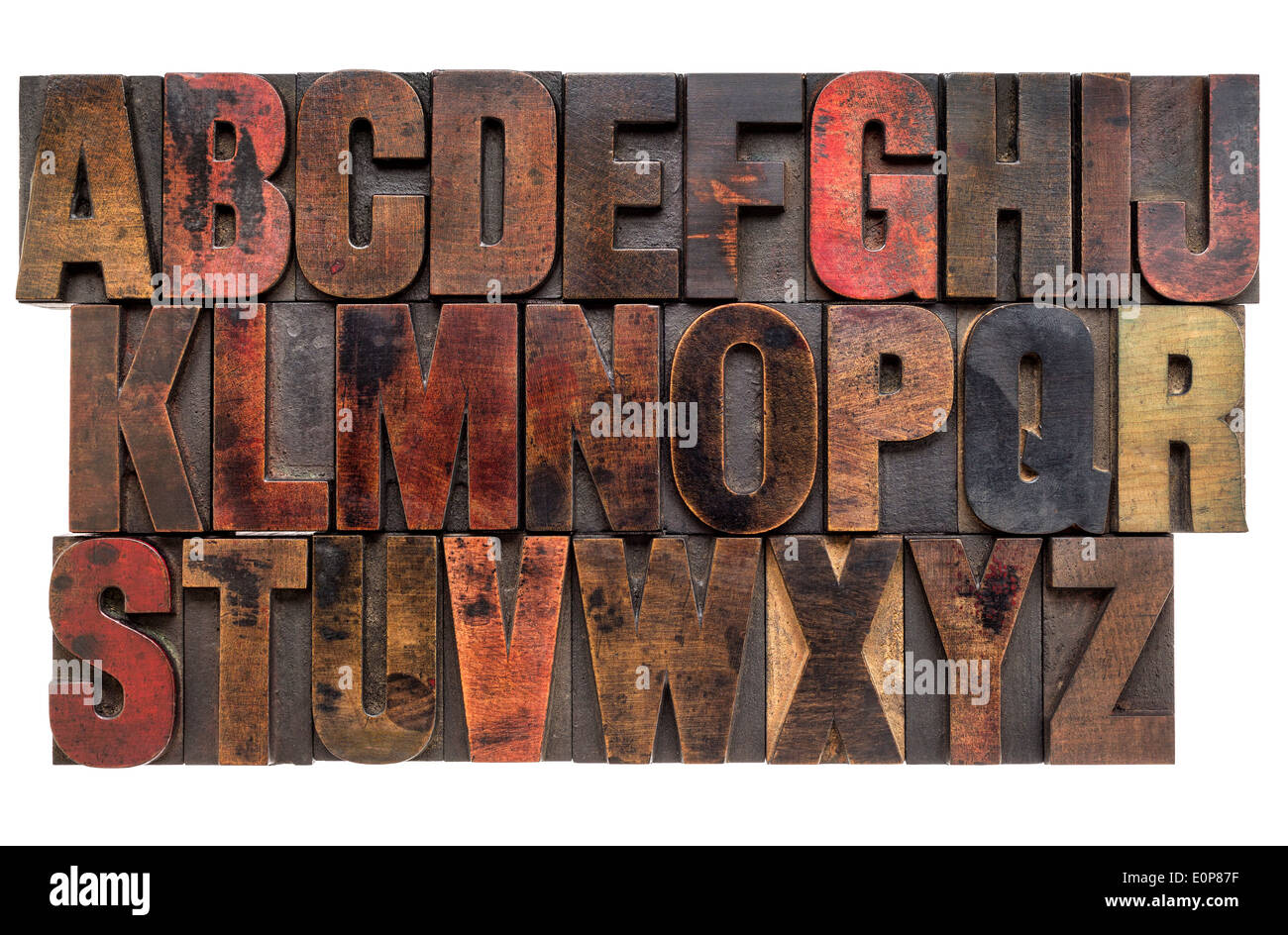 Englische Alphabet in Lettterpress Holzart Druckstöcken, durch Farbe Farben gebeizt Stockfoto