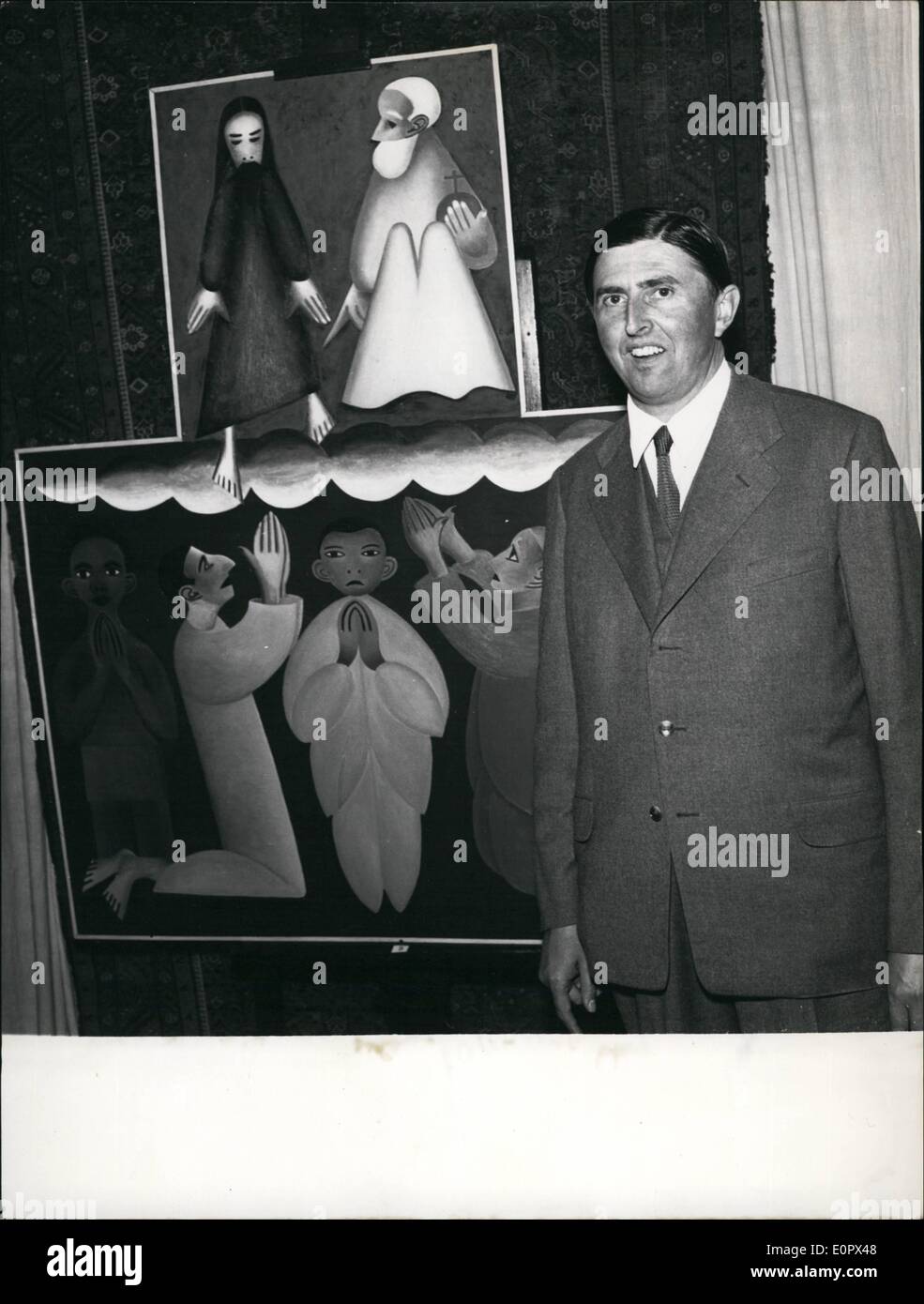 4. April 1957 - zeigt Foto bayerische Maler Bruno Tausend vor einem seiner Werke, die heute in München ausgestellt sind. Tausend Gemälde begann im Alter von 40, als er eine Privatschule und später an der Akademie besuchte. Dann kehrte er in seine Hütte in Oberbayern. Er sagt: seine Absichten: Ich Male nicht Natur, sondern die Schöpfung Gottes. Stockfoto