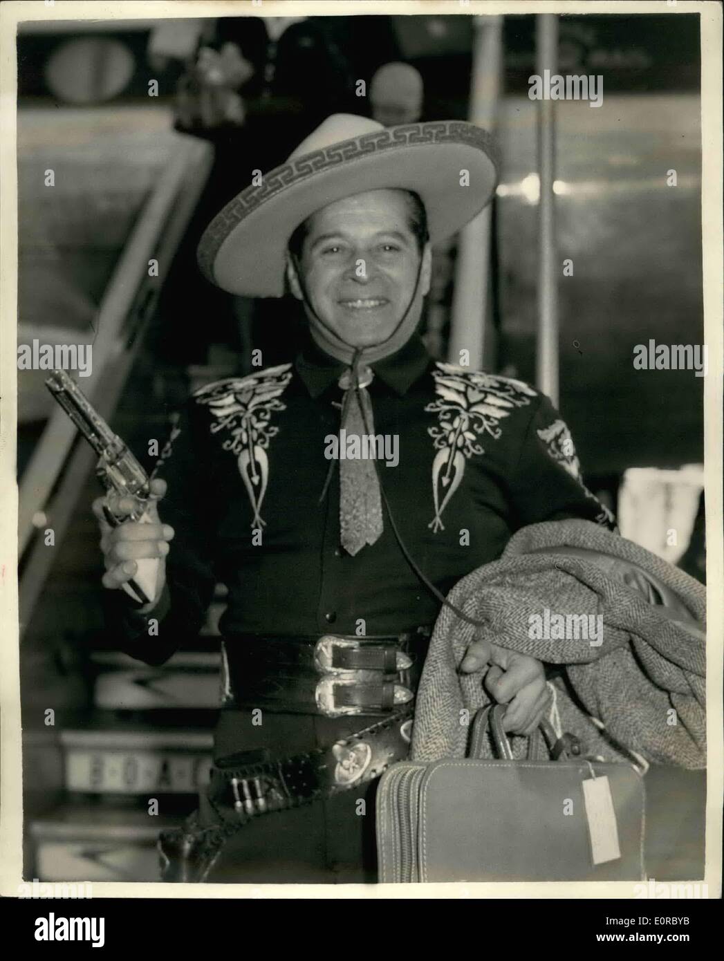 12. Dezember 1958 - kommt die Cisco Kid. Die Cisco Kid - mit bürgerlichem Namen Duncan Ronald ist - kam am Londoner Flughafen, an diesem Morgen. Er erscheint in der zugehörigen Rediffusion TV-Show '' Lucky Dip'', heute Abend. Das Foto zeigt die Cisco Kid auf hid Ankunft am Flughafen London Vormittag abgebildet. Stockfoto