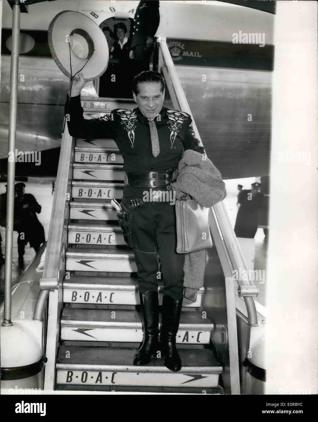 12. Dezember 1958 - kommt die Cisco Kid. Die Cisco Kid - mit bürgerlichem Namen Duncan Ronald ist - kam am Londoner Flughafen, an diesem Morgen. Er erscheint in der zugehörigen Rediffusion TV-Show '' Lucky Dip'', heute Abend. Das Foto zeigt die Cisco Kid auf hid Ankunft am Flughafen London Vormittag abgebildet. Stockfoto