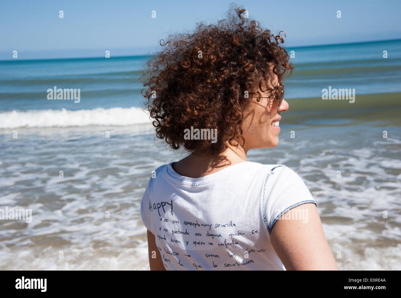 Frau am Strand Stockfoto