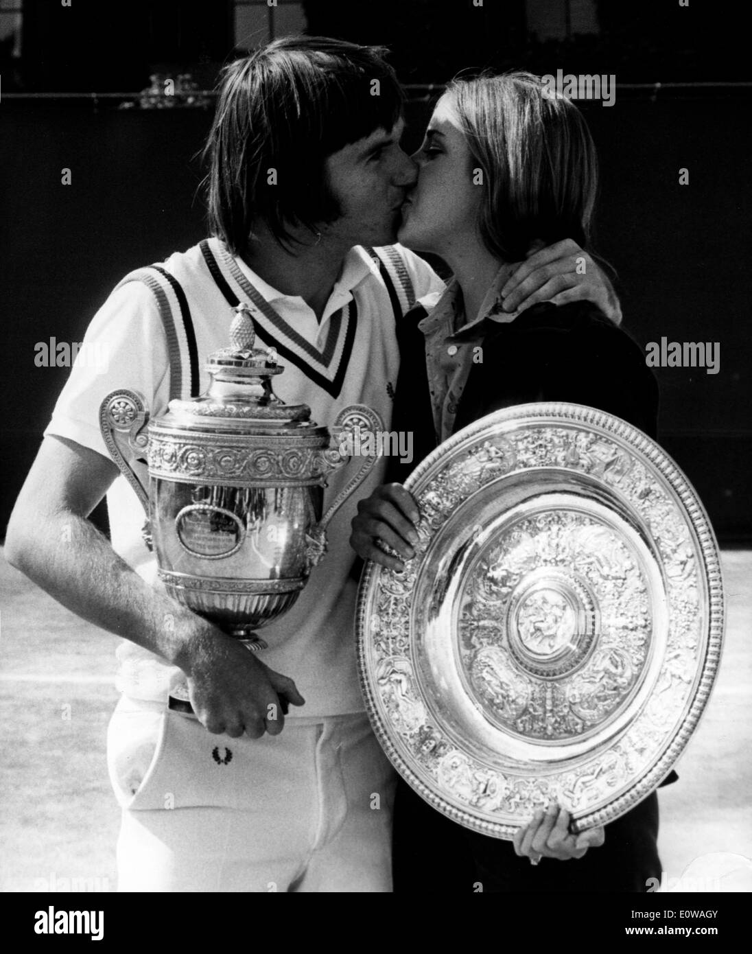 Tennis-Spieler Jimmy Connors küsst Frau Patti McGuire Stockfoto