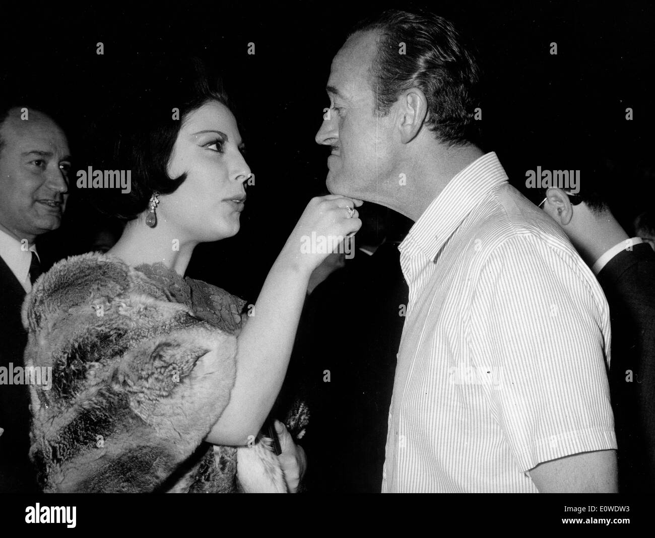 Schauspieler David Niven auf einer Cocktailparty für den Film "The Captive Town" Stockfoto