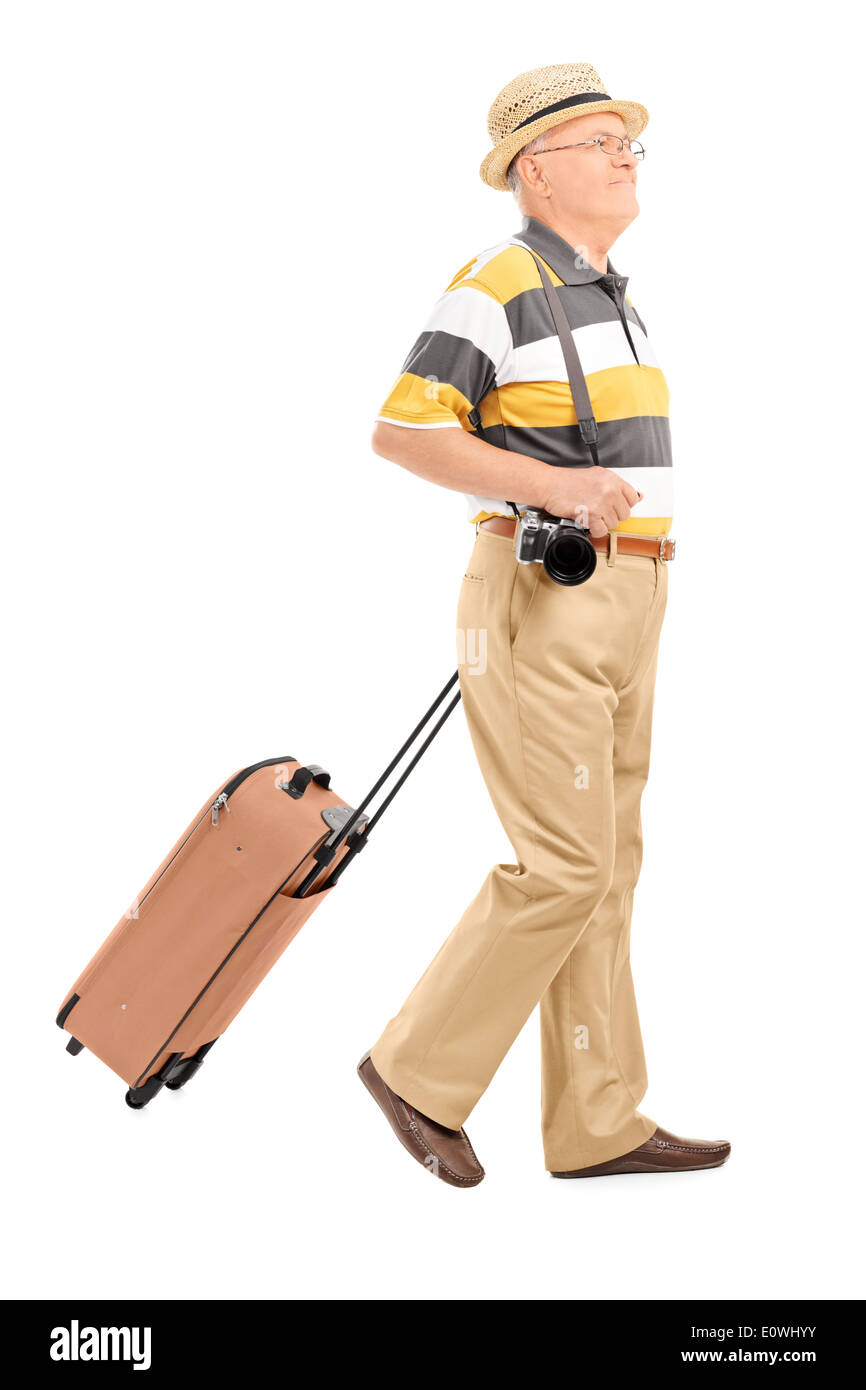 Ältere männliche Touristen mit seinem Gepäck Stockfoto