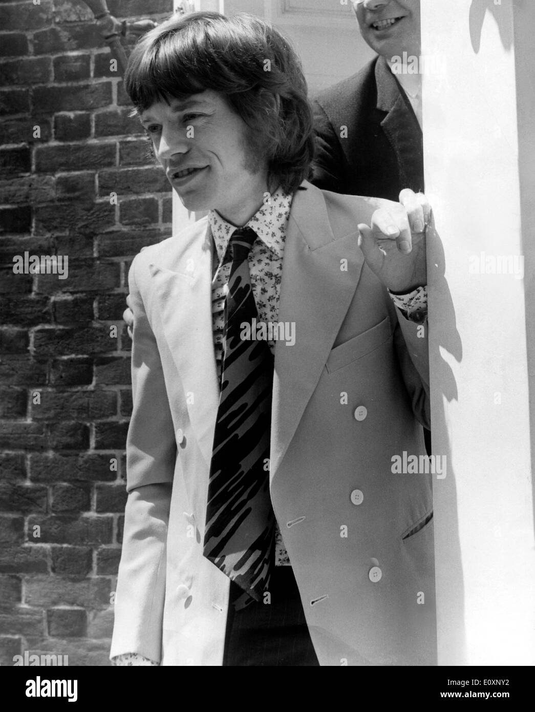 Rolling Stones-Sänger Mick Jagger verlassen eines Gebäudes Stockfoto