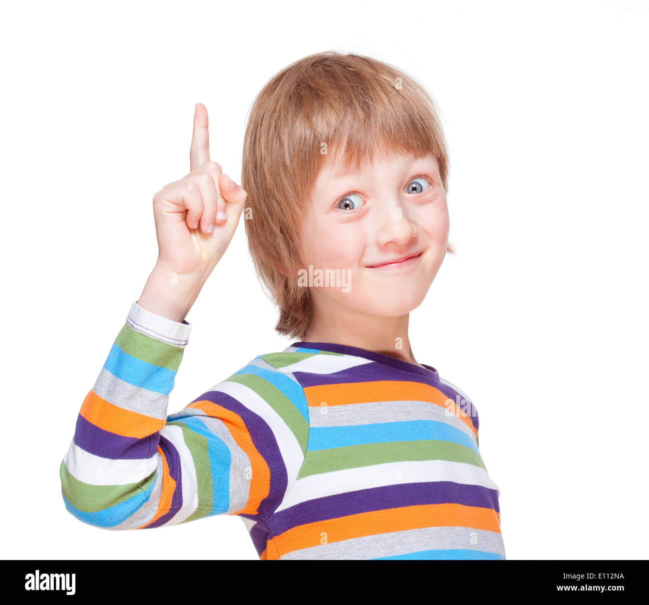 Boy Punkte auf seine Finger, hat eine Idee - Isolated on White Stockfoto