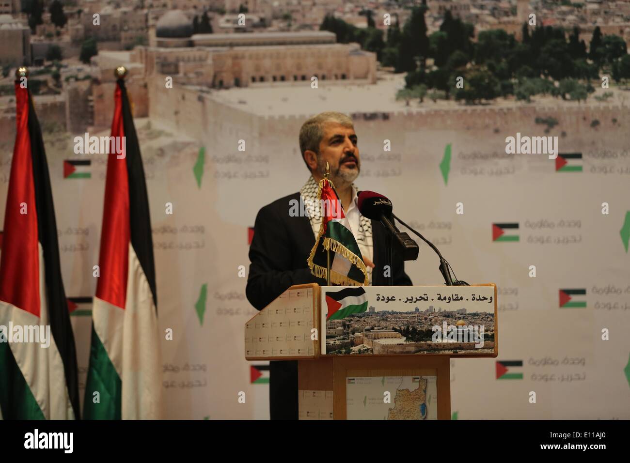 Doha, Doha, Katar. 20. Mai 2013. Palästinensischer politischer Führer der Hamas-Bewegung, Khaled Meshaal, spricht im Rahmen einer Feierstunde anlässlich der "Nakba", das jährliche Gedenken an was Palästinenser die Katastrophe in Doha, Katar, 20. Mai 2014 bezeichnen. Maschal sagte am Dienstag war die islamistische Gruppe nahe ausbessern Risse mit Rivalen Präsident Mahmoud Abbas Palästinensischen Befreiungsorganisation, schwor Widerstand gegen Israel wird aber weiterhin © Stringer/APA Images/ZUMAPRESS.com/Alamy Live-Nachrichten Stockfoto