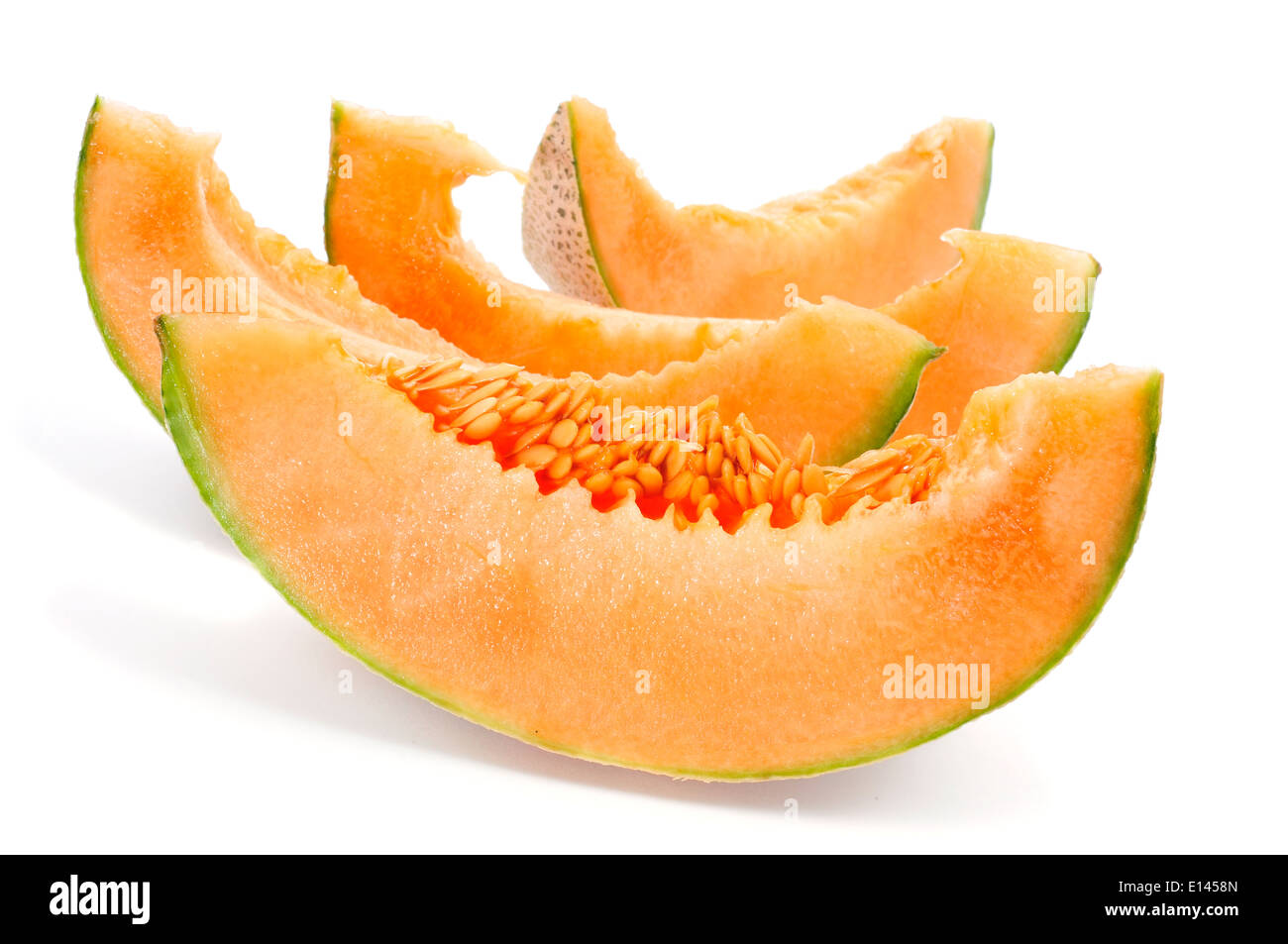 einige Scheiben des persischen Melone auf weißem Hintergrund Stockfoto