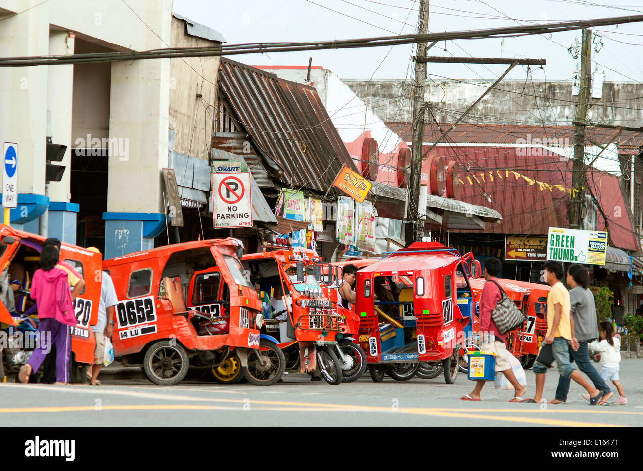 Dreirad-taxis in der Innenstadt von Butuan, Mindanao, Philippinen Stockfoto