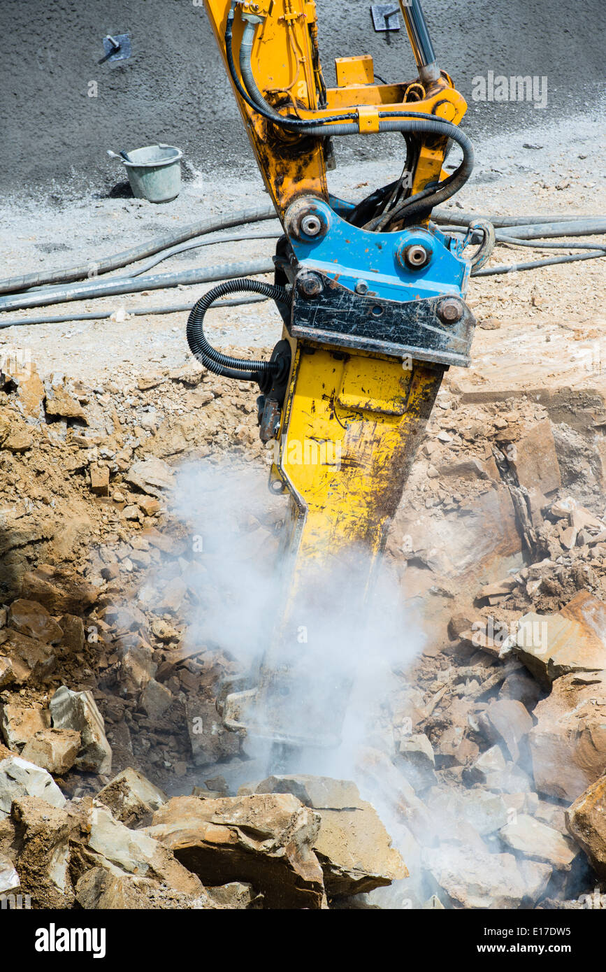 Bagger mit Meißel Stockfoto