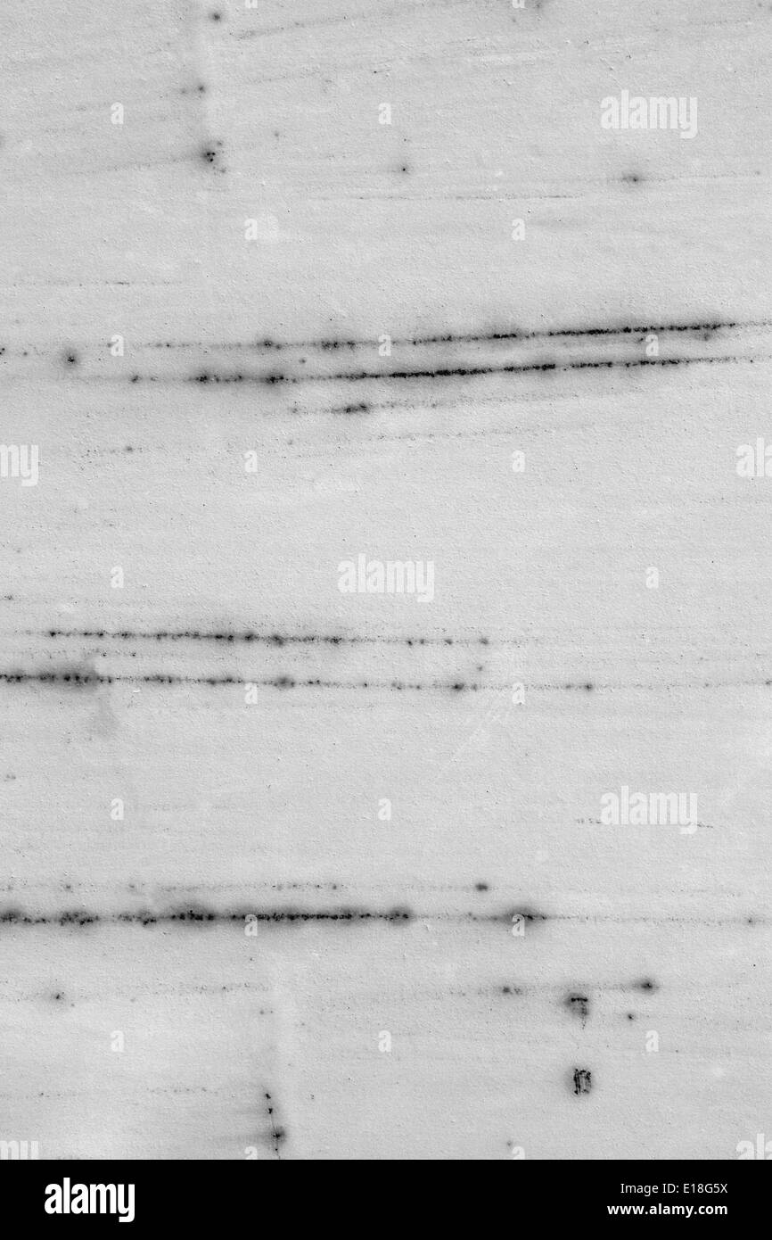 Graue abstrakten Hintergrund. Weiß lackiertes Eisen alte Mauer (monochrome Foto). Stockfoto