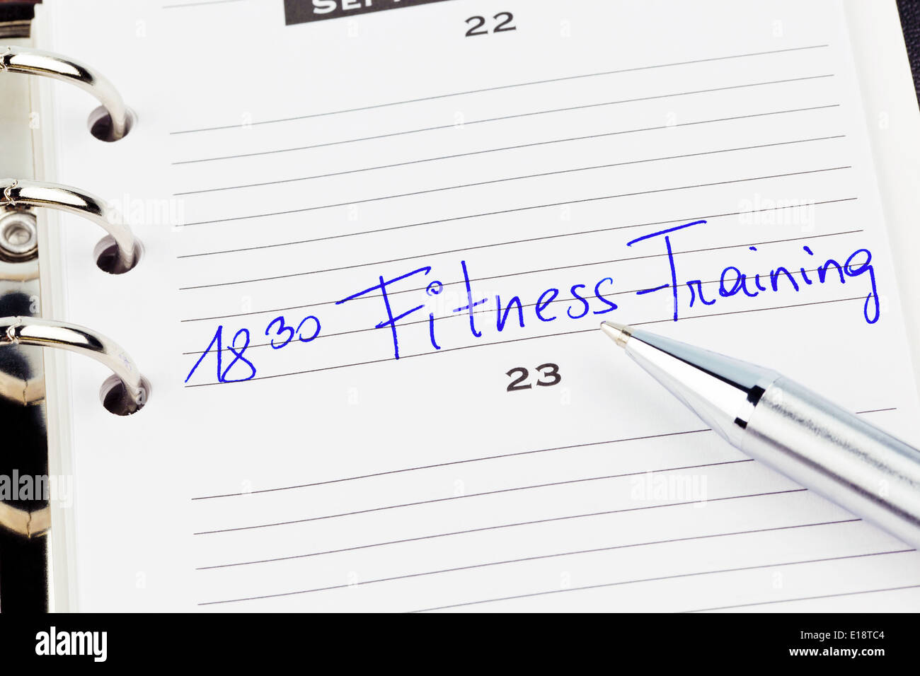 Ein Termin ist in Einem Kalender Eingetragen: Fitness-Training Stockfoto