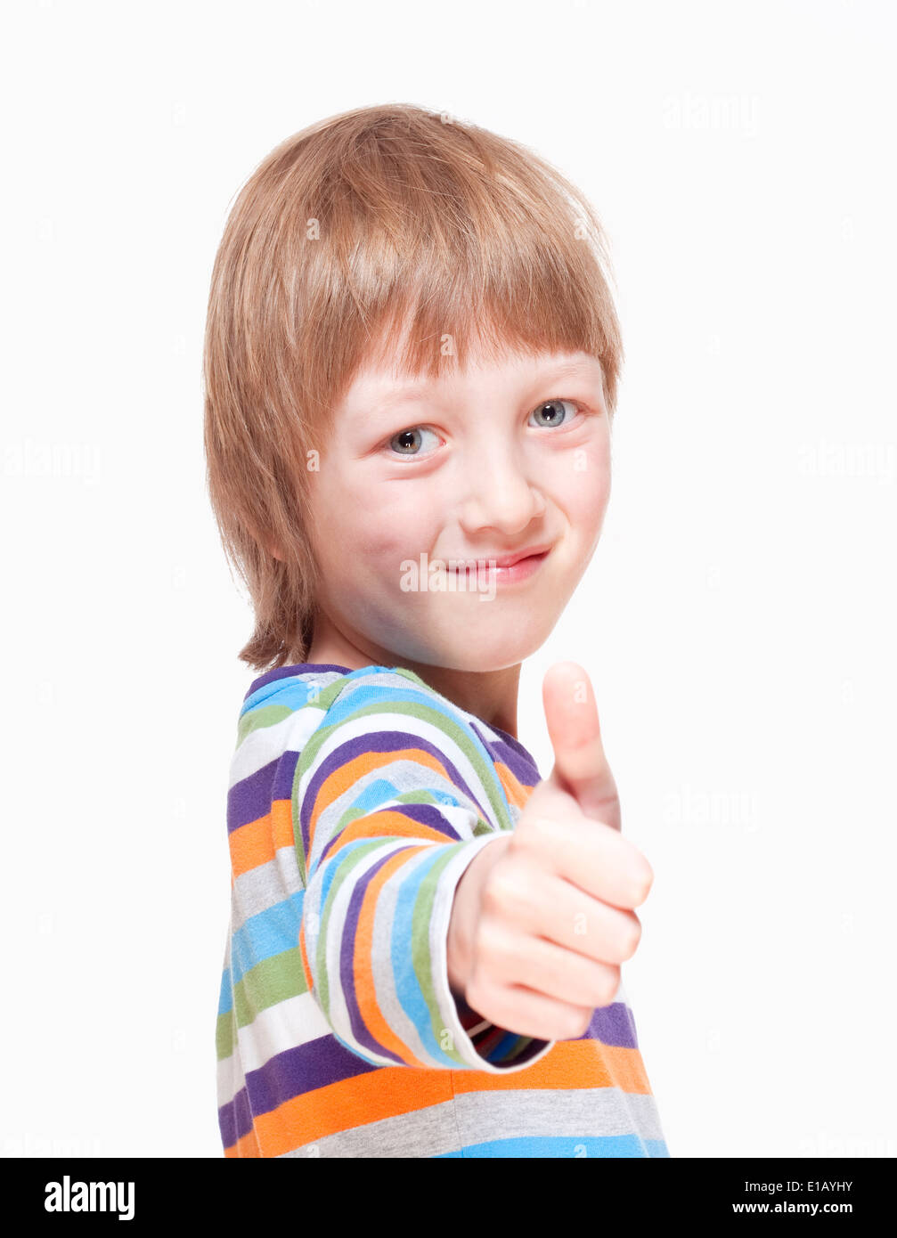 Junge mit blonden Haaren zeigen, Daumen nach oben Handzeichen - Isolated on White Stockfoto