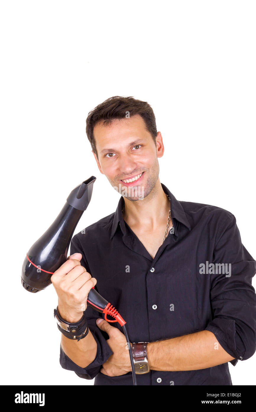 junge lächelnde männlichen Barbier mit Fön Stockfoto