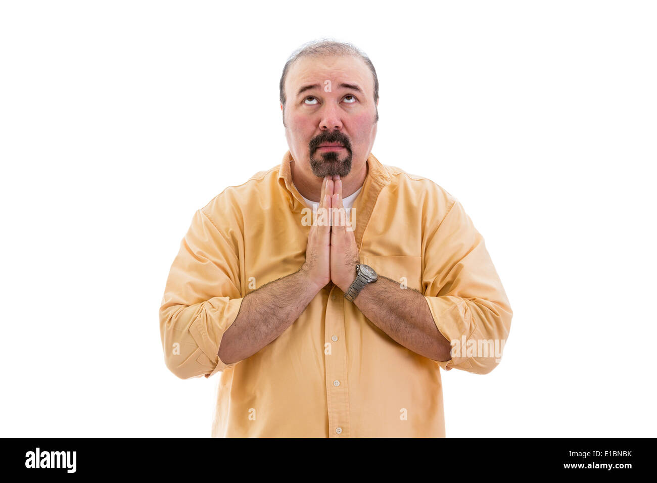 Religiösen Menschen beten zu Gott, mit seinen Händen umklammert, als er mit seinen Augen zum Himmel, Teil einer Serie über Körper la Hilfe sucht Stockfoto