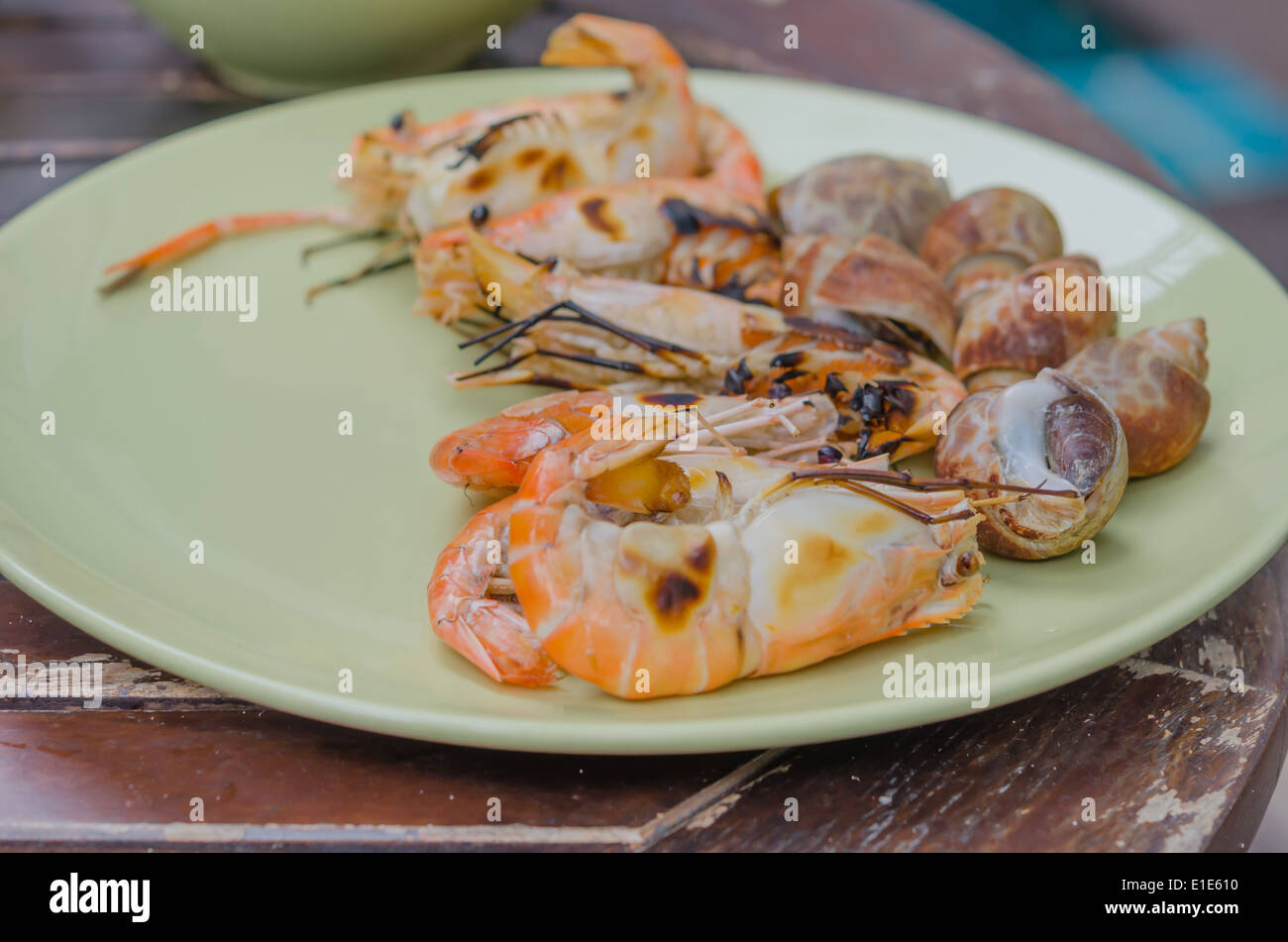 Gefleckte Babylon und Garnelen auf Teller vom Grill Stockfoto