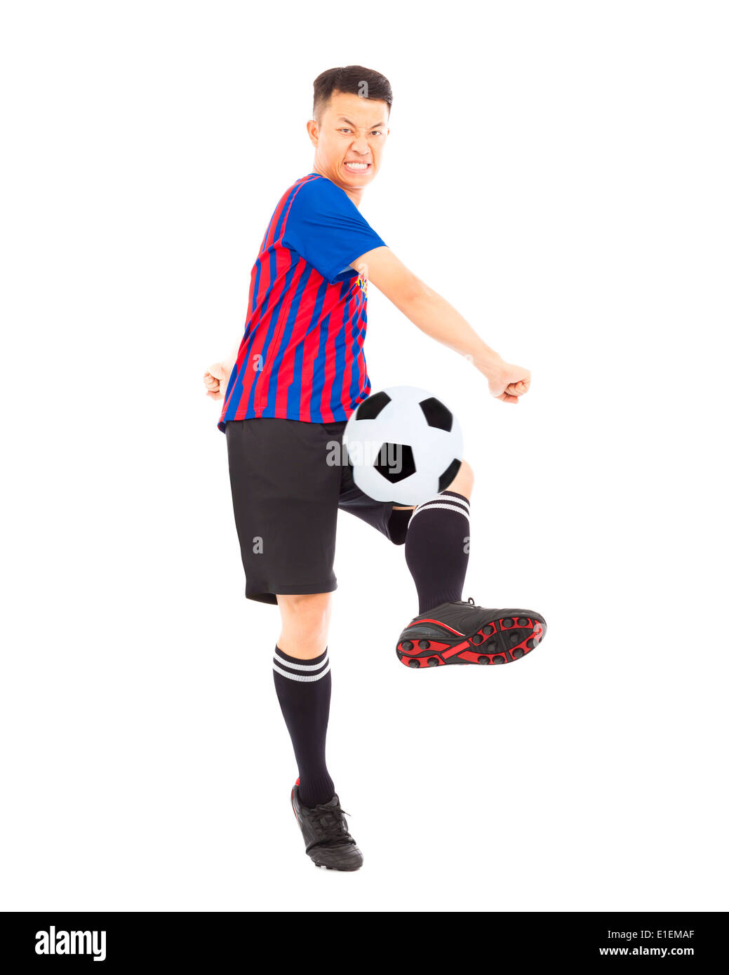 Junge Spieler munter Fußball Stockfoto