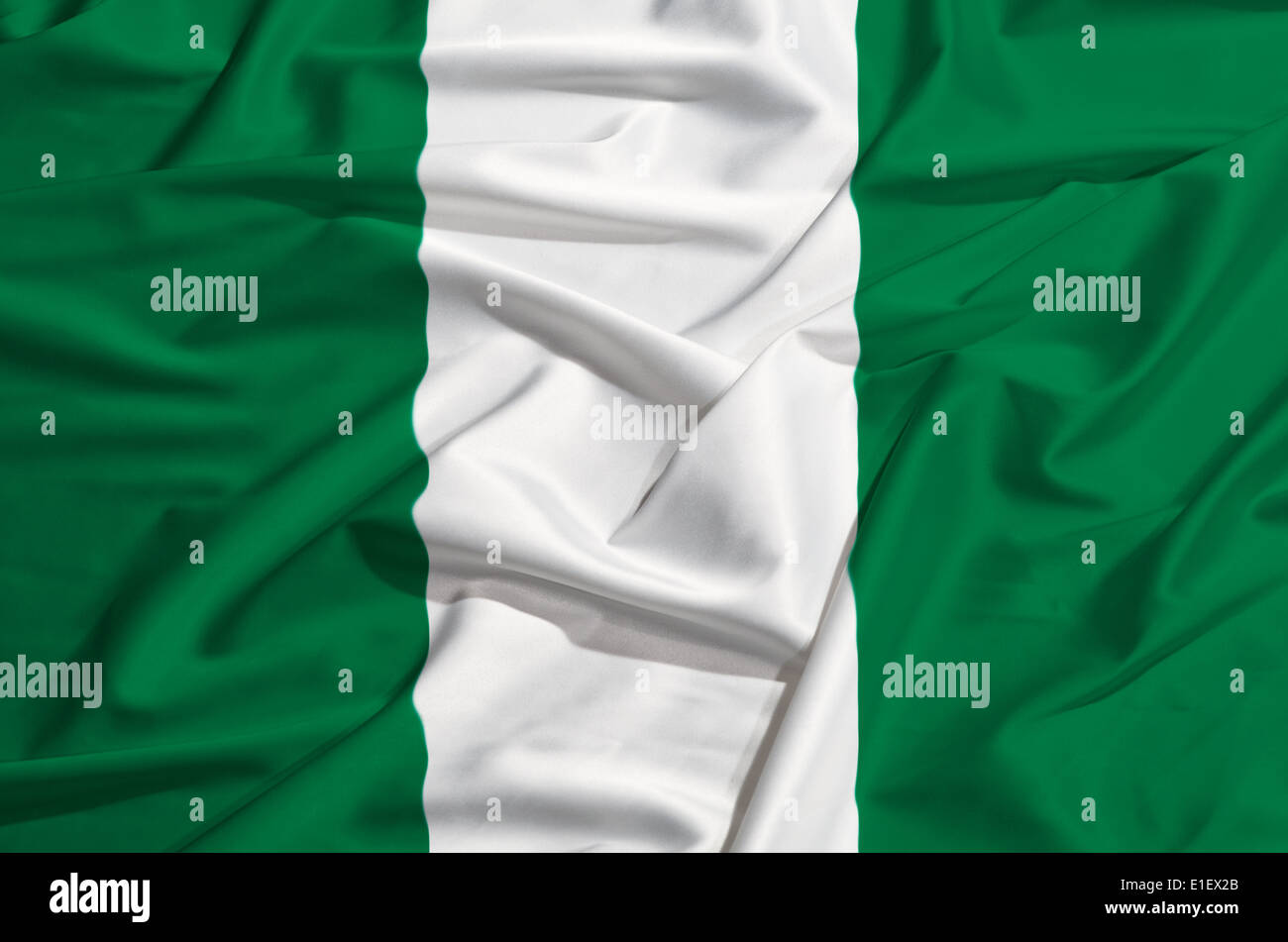 Nigeria Flagge auf einer Seide drapieren winken Stockfoto