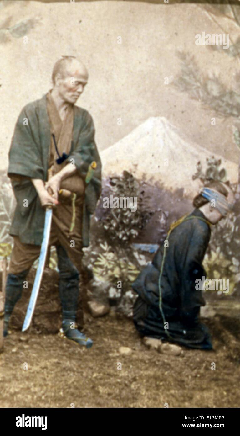 Porträt des Henkers von Kanagawa mit Schwert und Gefangene von John Thomson (1837-1921) zu fotografieren. Datiert 1890 Stockfoto