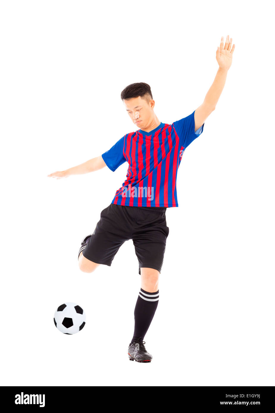 Junge Spieler munter Fußball Stockfoto