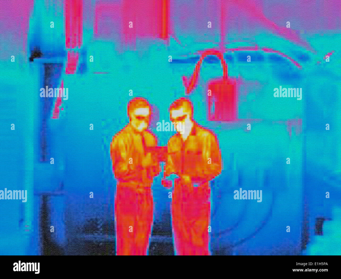 Infra Red Heat Bild von Fabrikarbeitern Stockfoto