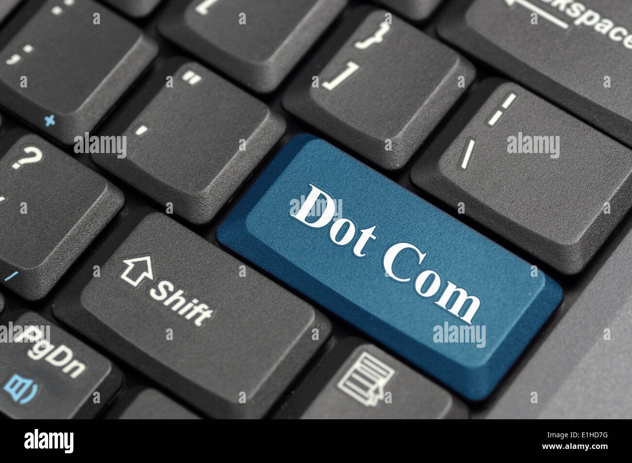 Blue Dot Com-Taste auf der Tastatur Stockfoto
