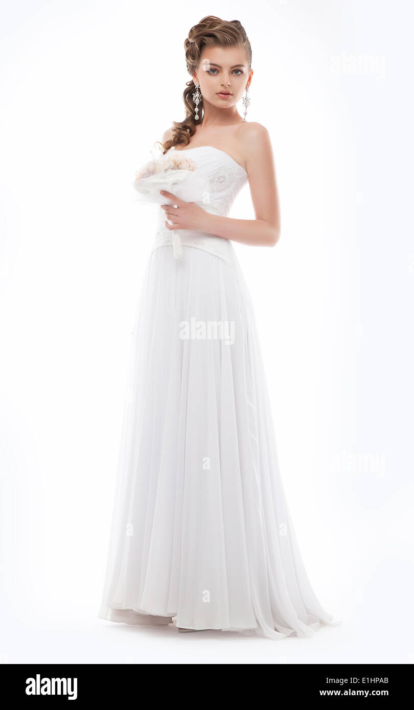 Schöne Braut gekleidet in weißen Kleid posiert isoliert Studioaufnahme Stockfoto