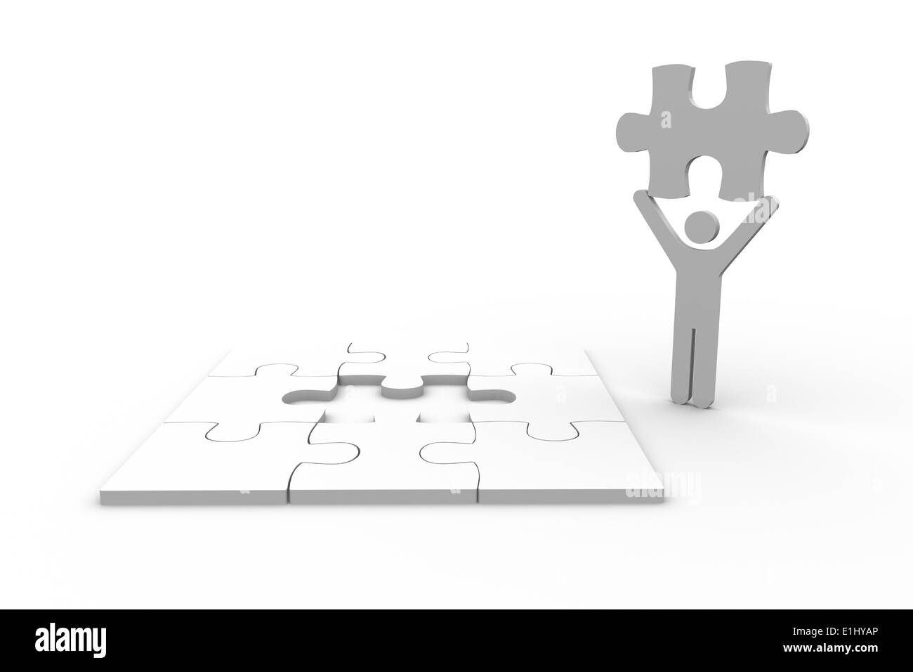 Weiße menschliche Figur hält Puzzleteil Stockfoto