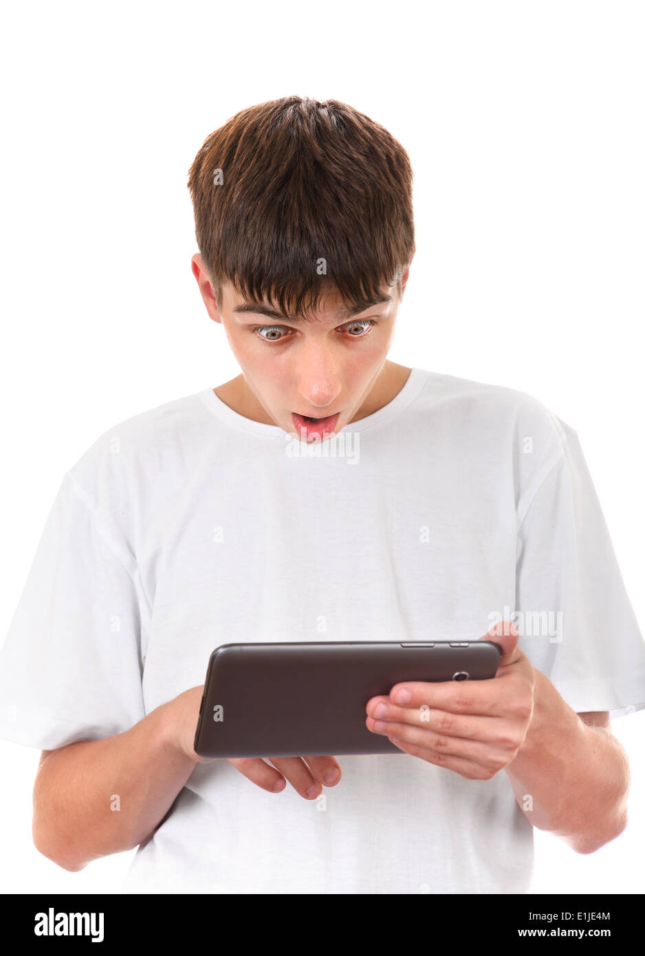 Teenager mit Tablet-PC Stockfoto