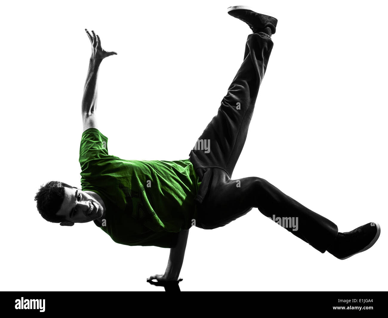 ein junger akrobatische Pause Tänzer Breakdance Mann in Silhouette weißen Hintergrund Stockfoto