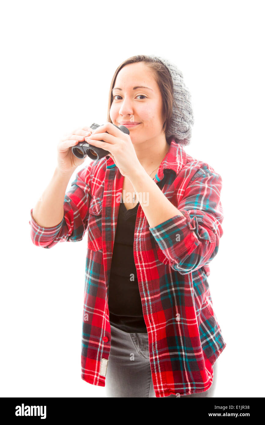 Junge Frau Holding Fernglas Stockfoto