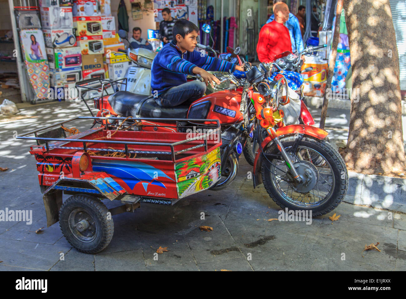 Junge auf einem Beiwagen Stockfoto