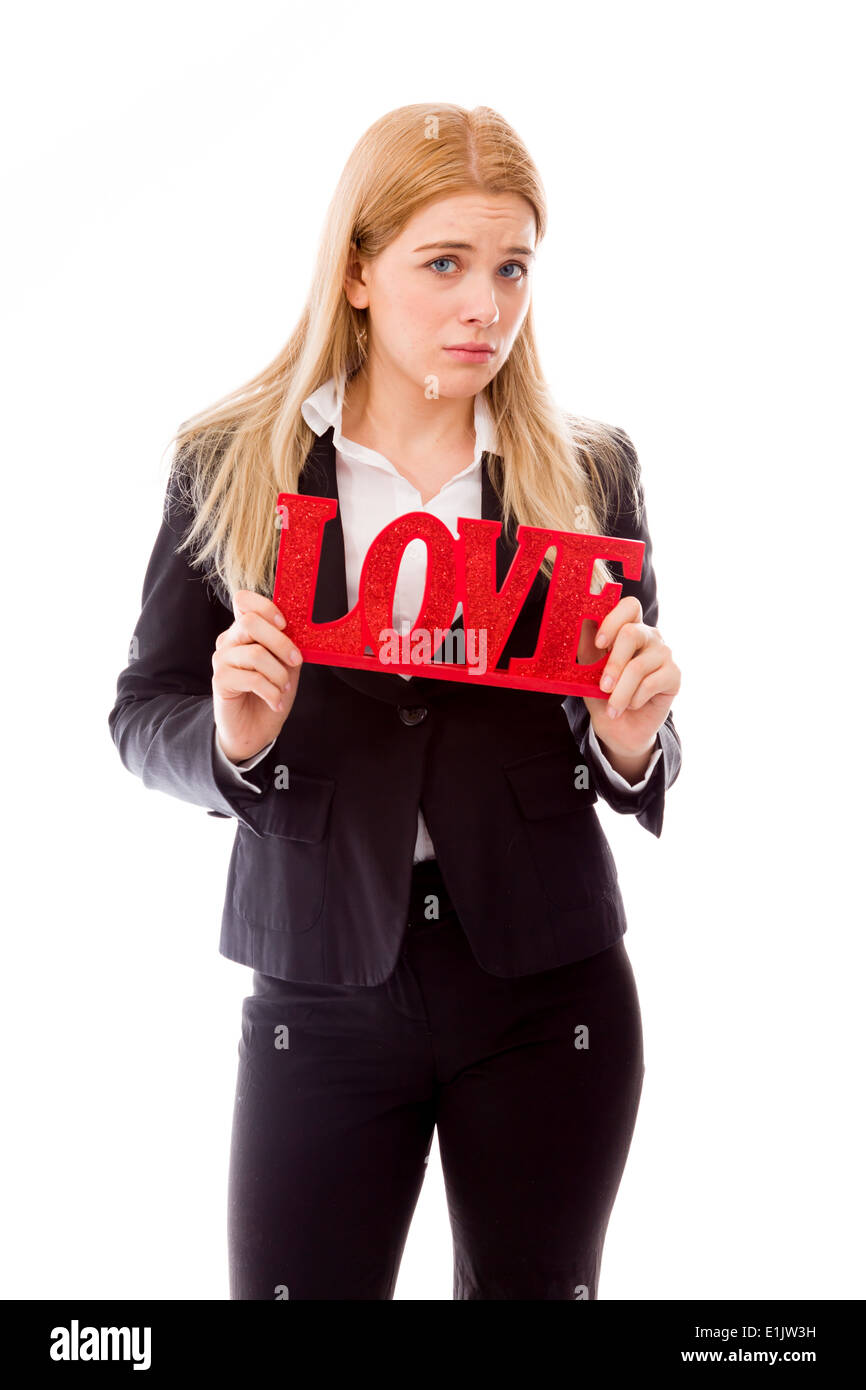 Enttäuscht Geschäftsfrau mit roten 'LOVE' text Stockfoto