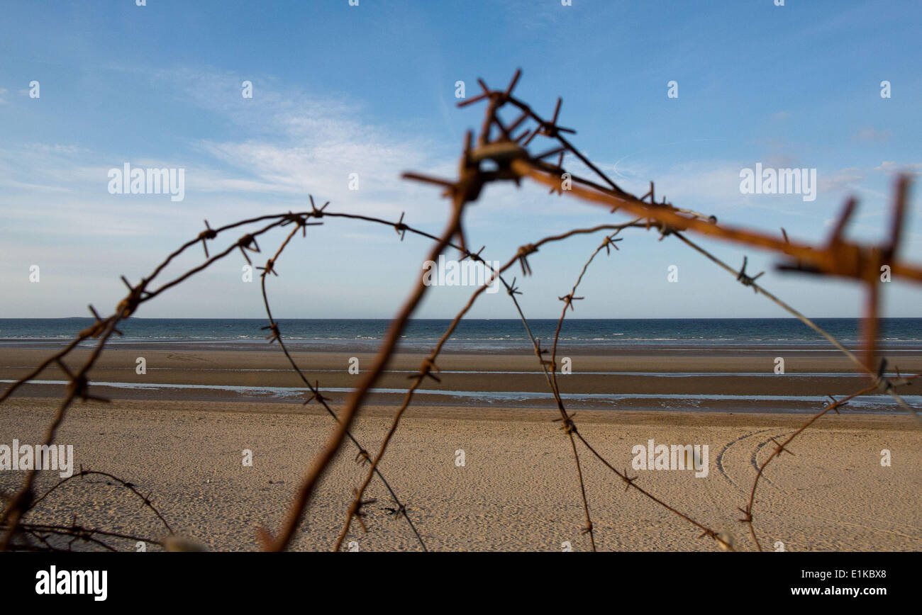 Normandie, Frankreich. 5. Juni 2014. Verrosteter Stacheldraht auf Utah Beach in der Normandie, 5. Juni 2014. Eine Zeremonie wird am 6. Juni 2014 anlässlich des 70. Jahrestages der d-Day Landung durch die Alliierten in Frankreich stattfinden. D-Day war der Beginn des Vorschusses in Europa führte zu der Niederlage Nazi-Deutschlands. Foto: MICHAEL KAPPELER/Dpa/Alamy Live News Stockfoto