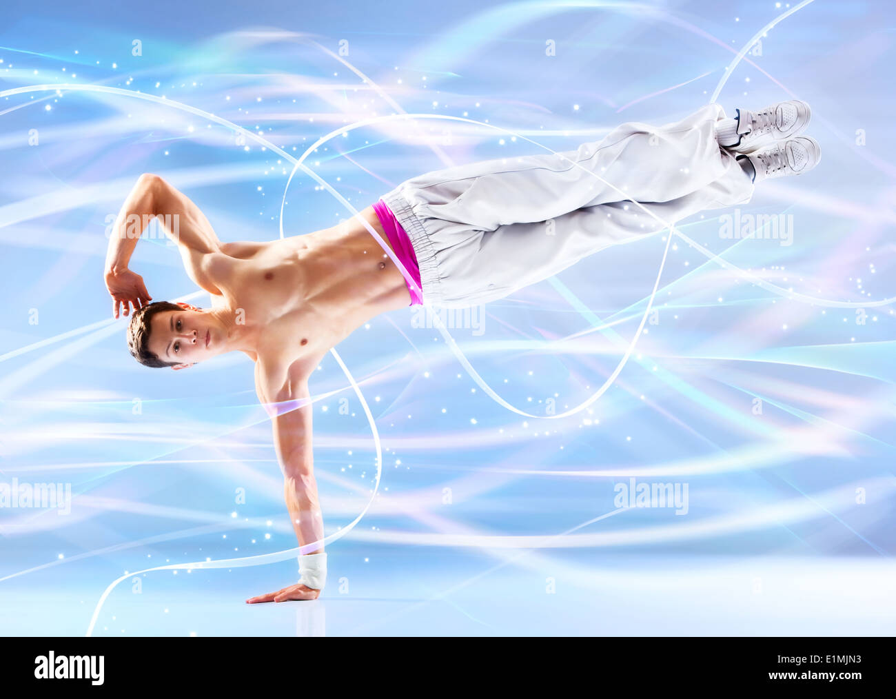Junger Mann Modern Dance. Mit Lichteffekten. Stockfoto