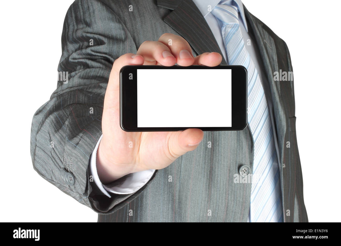 Geschäftsmann hält leere Smartphone auf weißem Hintergrund Stockfoto