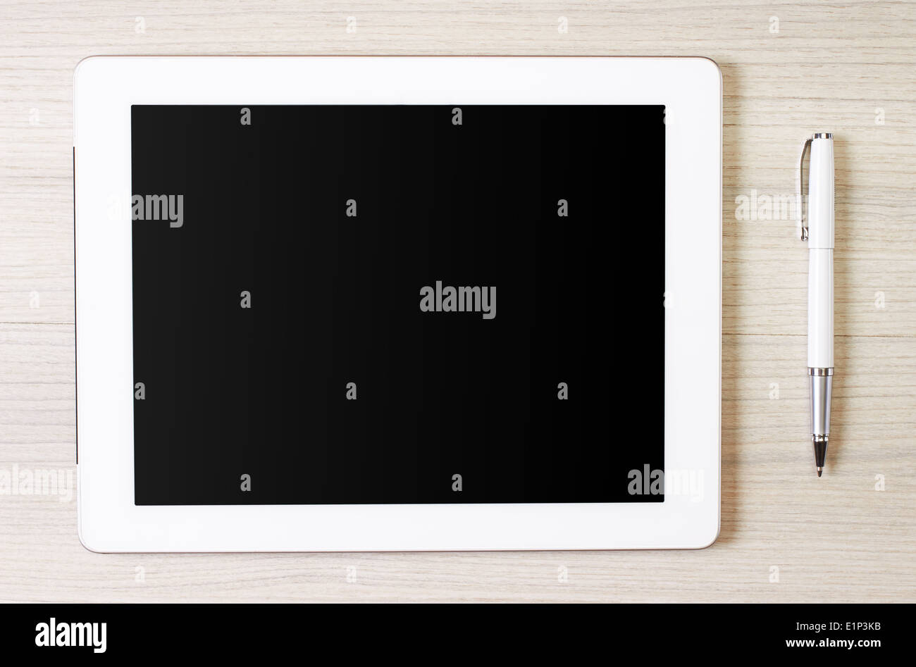 Digital-Tablette auf Holztafeln und Stift Stockfoto