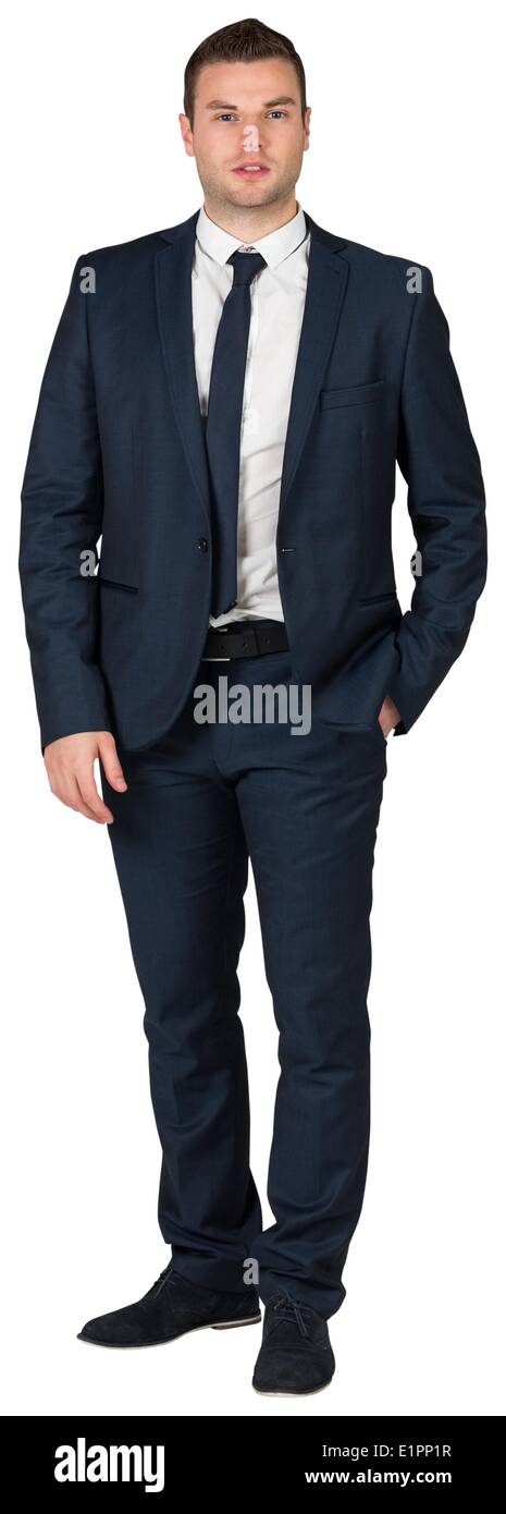 Geschäftsmann, stehend mit Hand in der Tasche Stockfoto